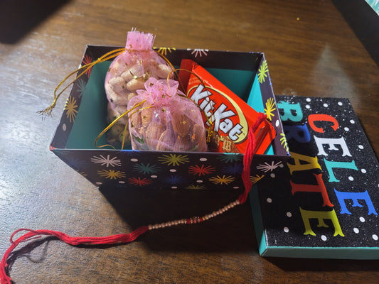 Rakhi Hamper With Rakhi & Dry Fruit (3×4 Inches Pouch)