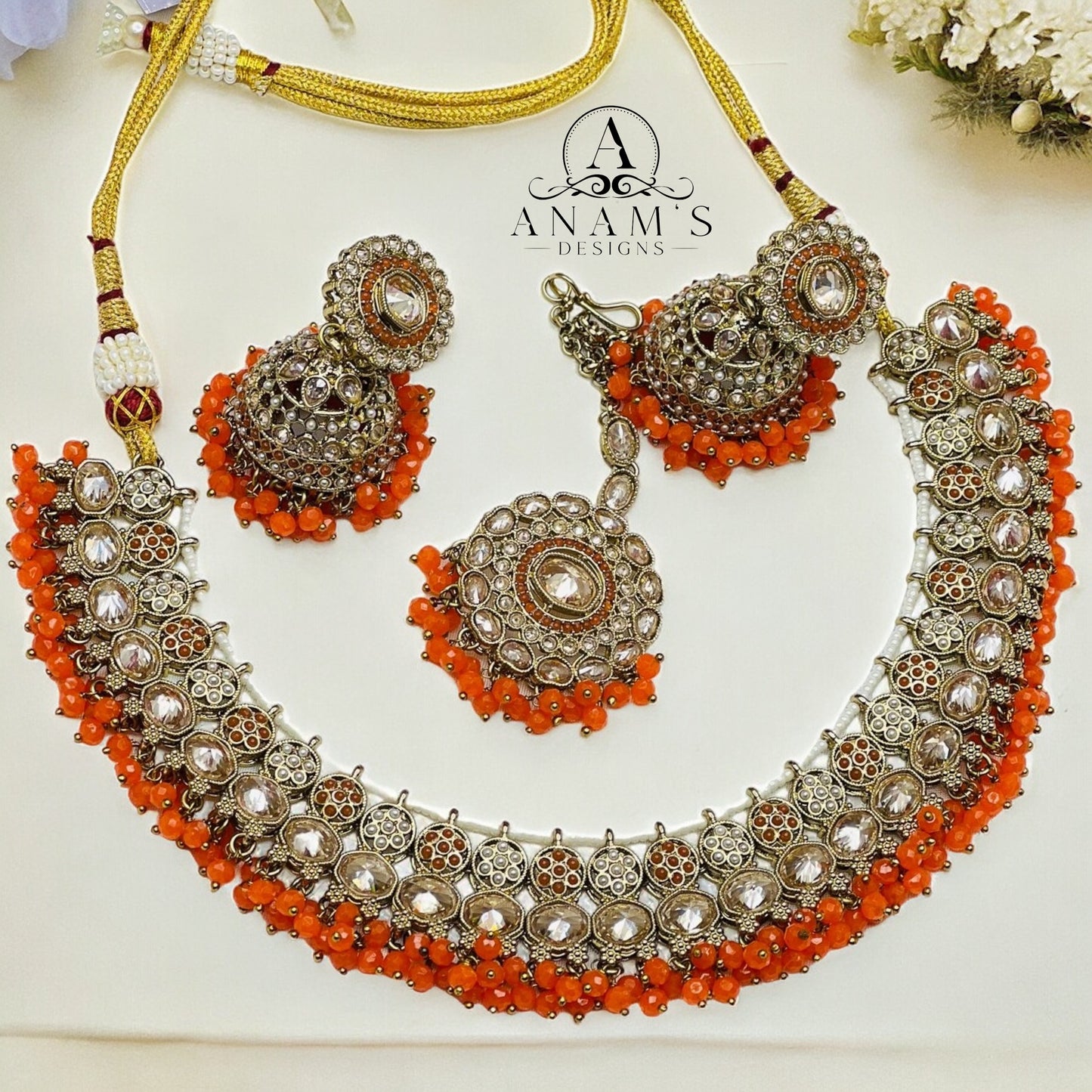 Quality Polki Choker Set With Very Lightweight Jhumkis. (Orange)