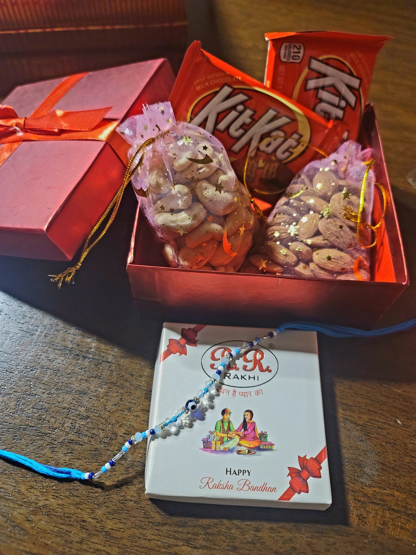 Rakhi Hamper With Rakhi & Dry Fruit (3×4 Inches Pouch)