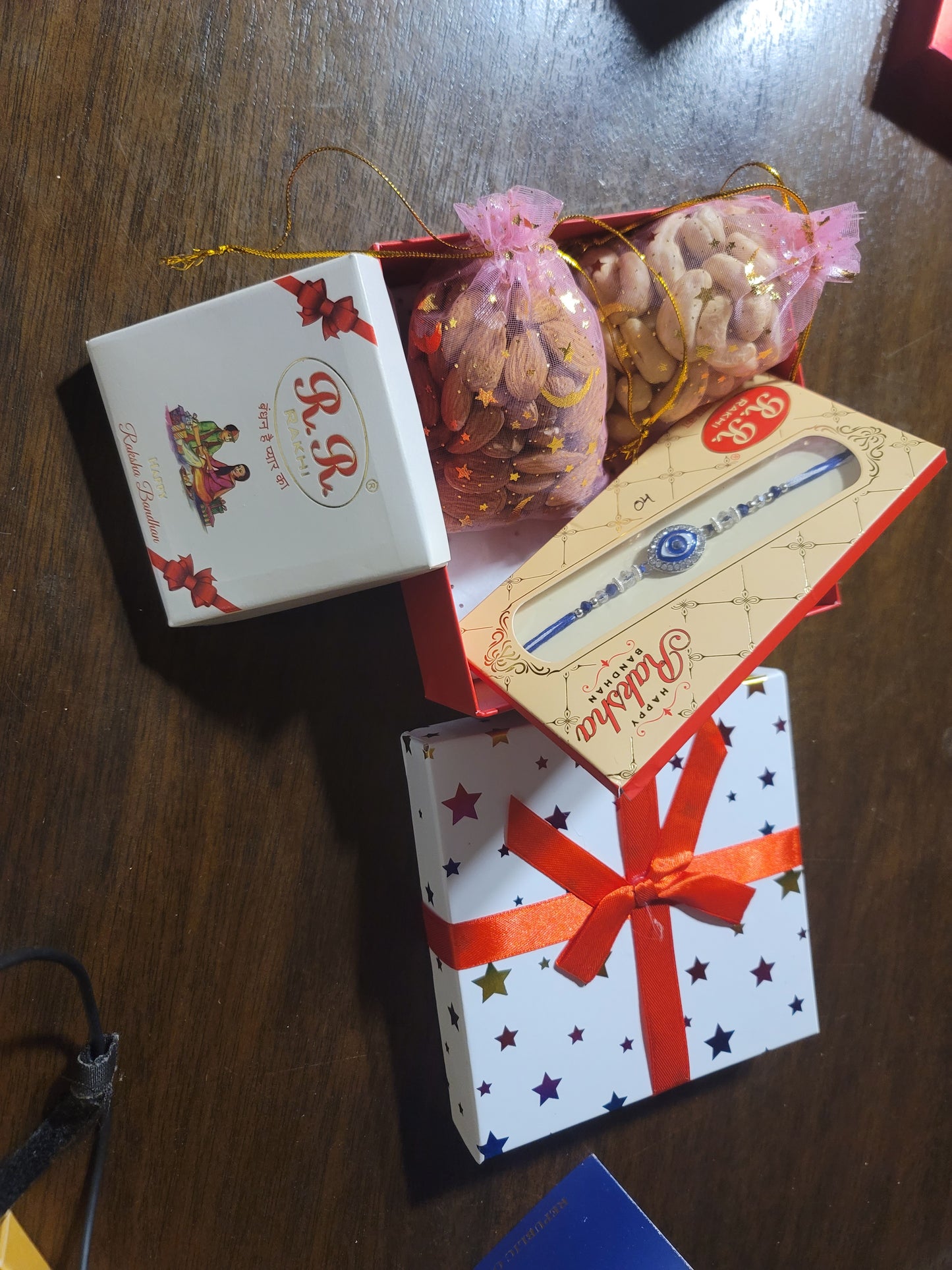 Rakhi Hamper With Rakhi & Dry Fruit (3×4 Inches Pouch)